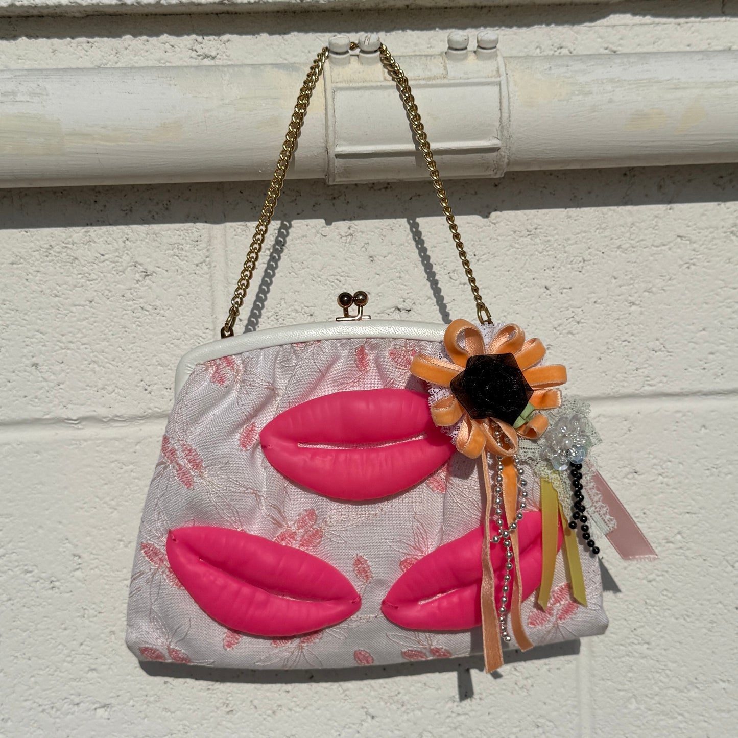 The Three Lips Purse